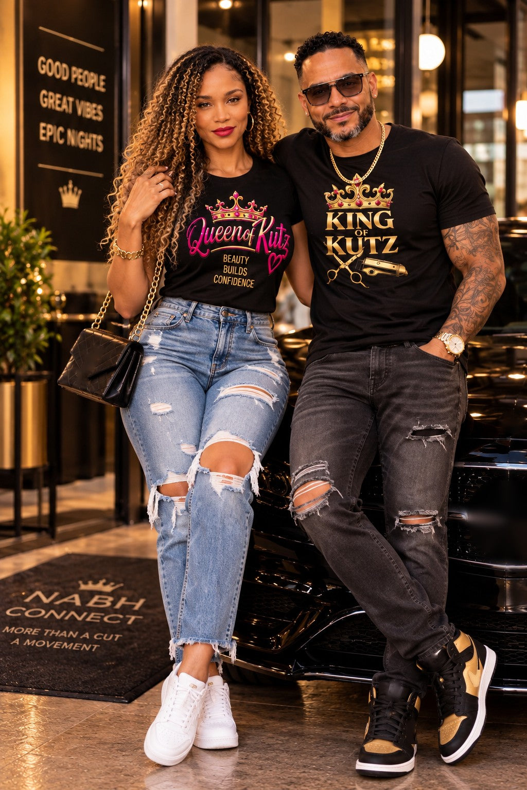 Porcia and Pucho wearing the Queen of Kutz and King of Kutz tees